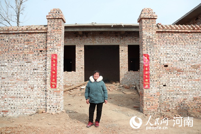 浚县受灾群众住新房拿红包