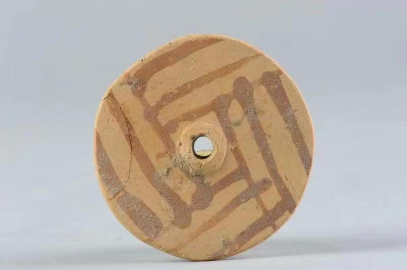【行走河南·读懂中国】陶纺轮：新石器时代的纺线用具