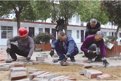 南阳市城管局联建帮扶进社区——榆树庄社区初现俏模样