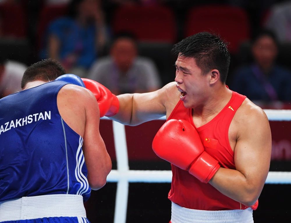 5公斤级四分之一决赛中,河南选手王向阳2:3遗憾不敌曾夺得亚锦赛铜牌