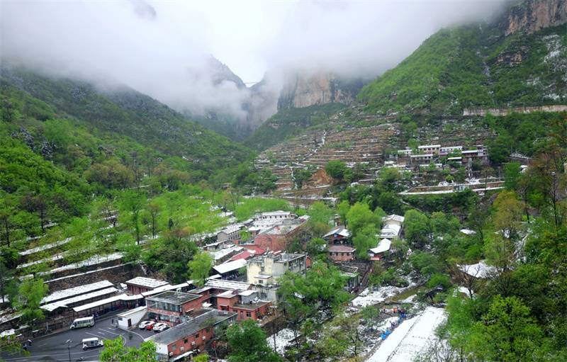 行走河南·读懂中国丨安阳林州： 春雪罩青山 美景如画卷