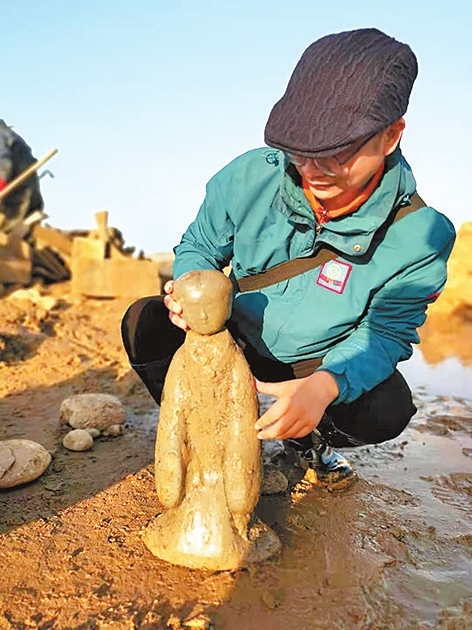 洛陽(yáng)黃河河道首次發(fā)現(xiàn)完整西漢陶仕女俑