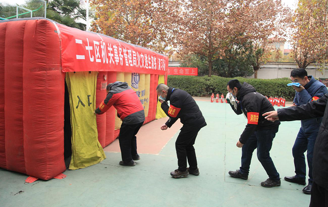 郑州市二七区事管局举行消防知识培训和火灾逃生演习